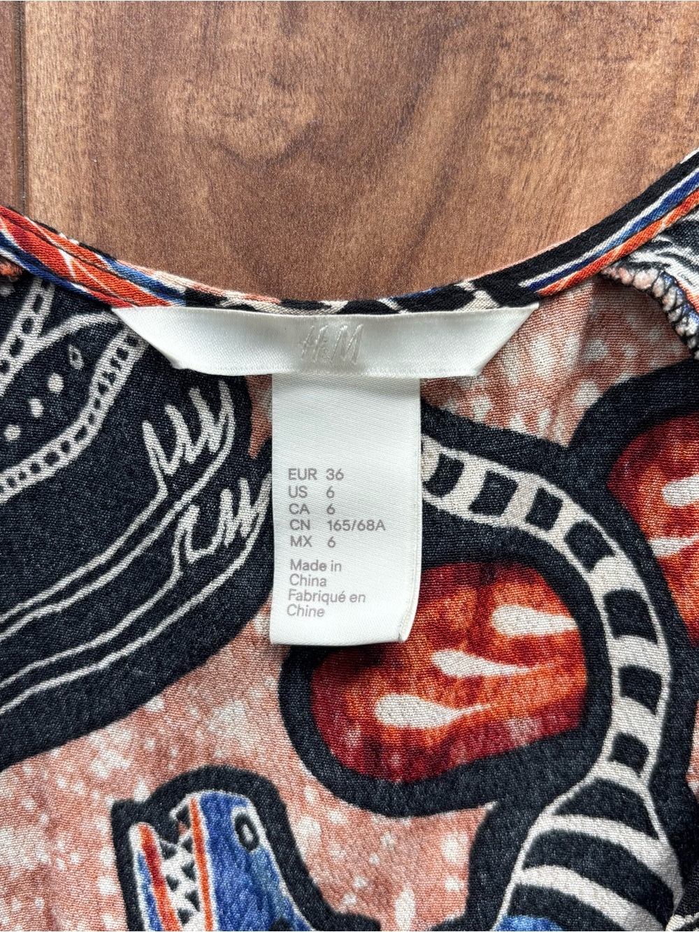 Vibrant Leaf Print Long Sleeve Romper in Black & Rust - Picture 4 of 7